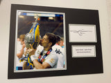Gjanni Alioski Hand Signed Leeds United Centenary Promotion Photo Mount