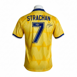 Gordon Strachan hand signed Leeds United away shirt from 1991/1992 when Leeds won the old First Division - the last champions. Signed at a private signing session, the shirt comes with out holographic certificate of authenticity and photo proof. 
Also available to be framed or purchased with our official Leeds United gift box.